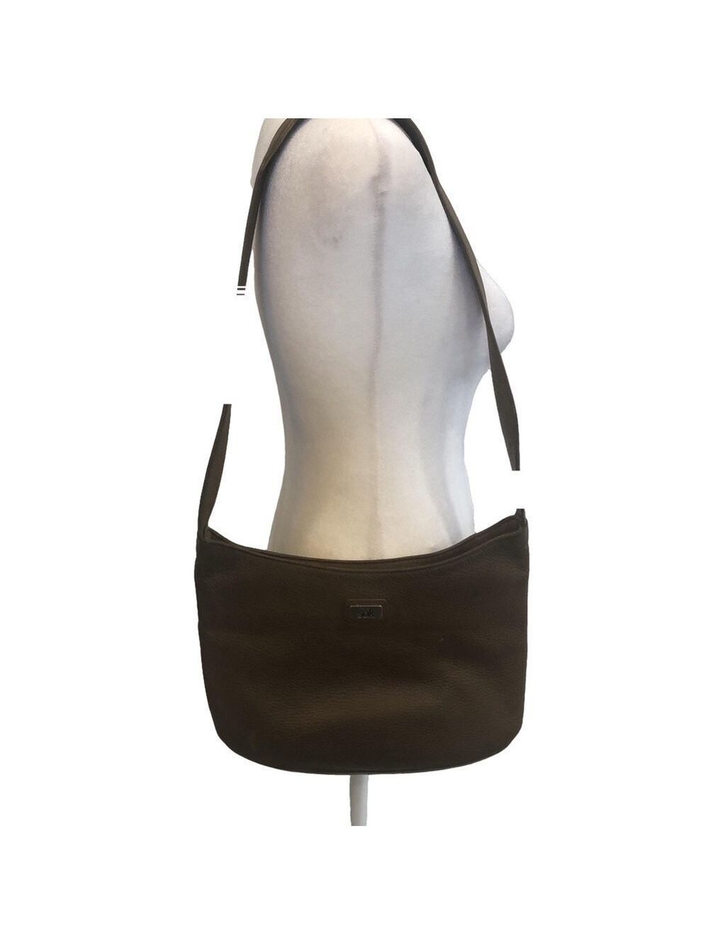 The Sak brown leather shoulder bag. Top zip. Casual outside zip pocket